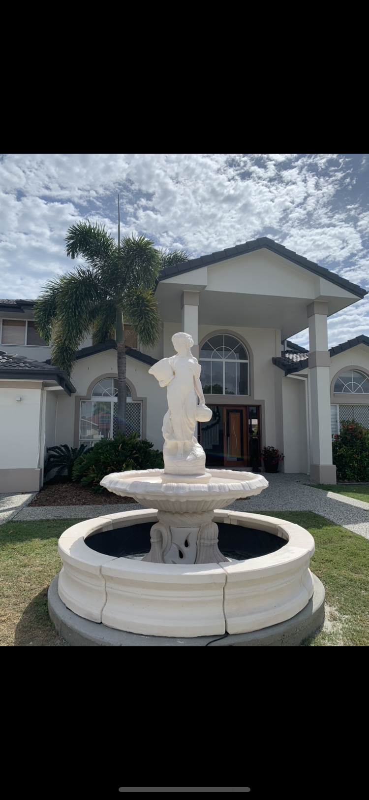 Italian fountain with basket lady and traditional pond surround