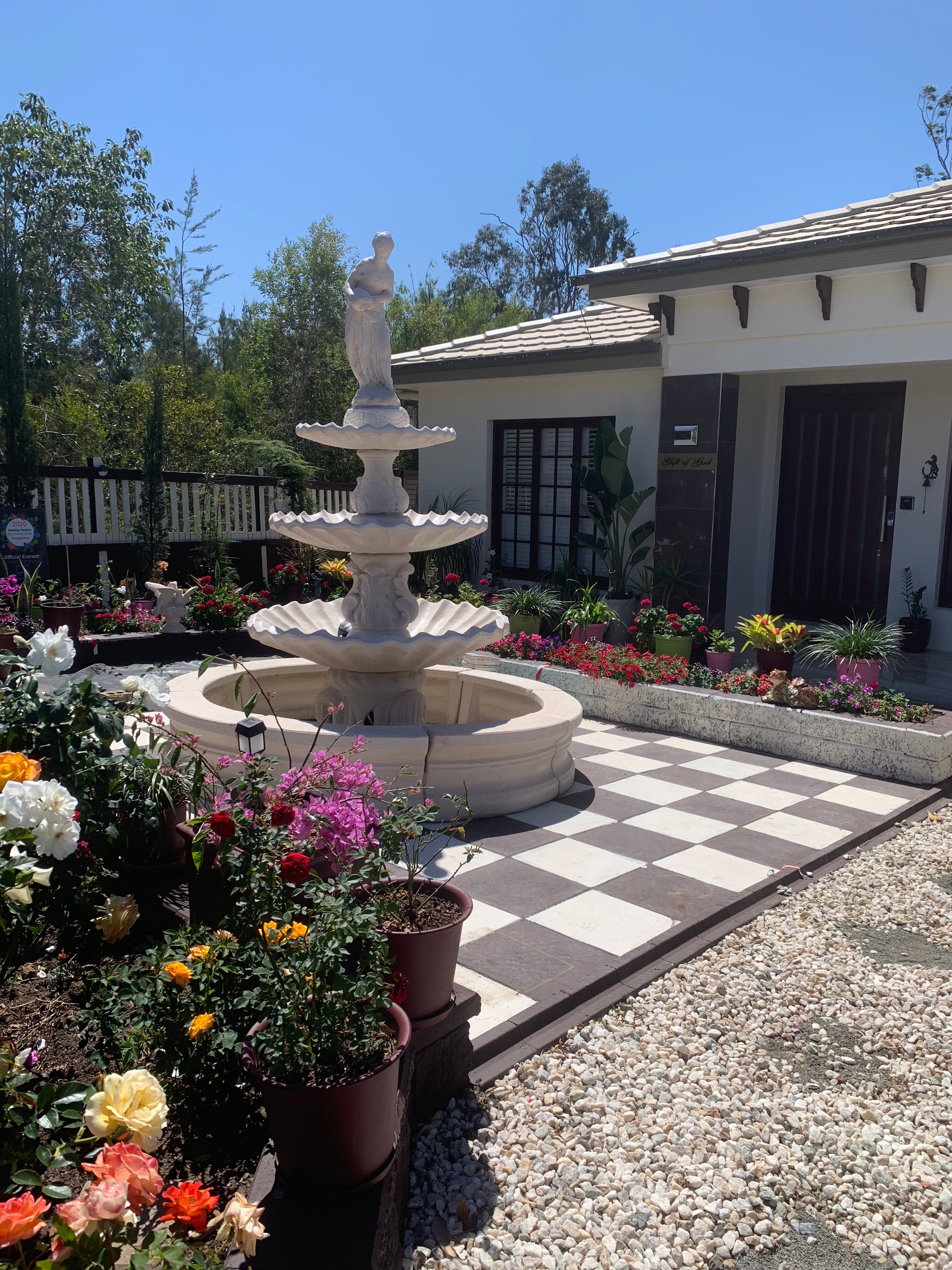 3 tier scollup fountain with pourer lady and traditional pond surround