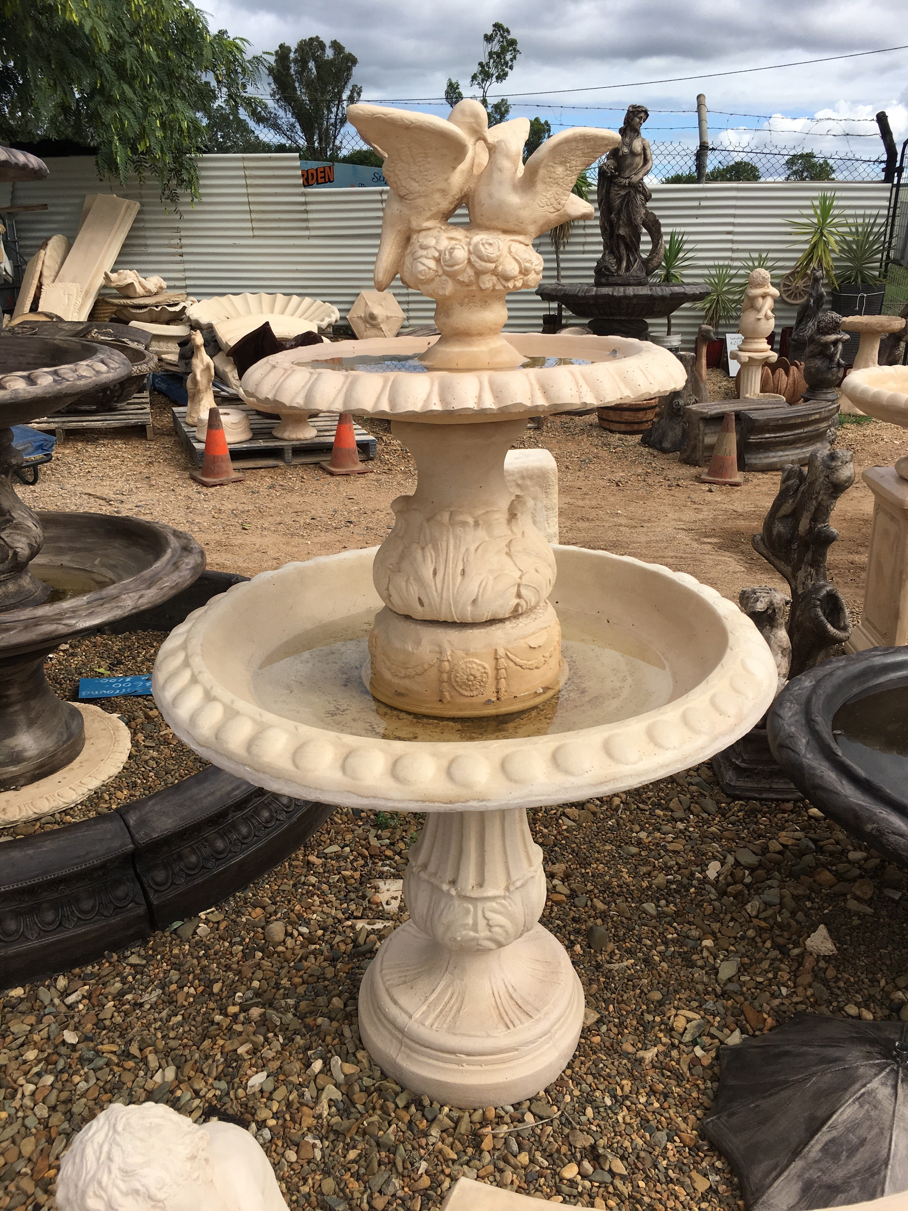 2 tier diamond on tall leg with doves fountain