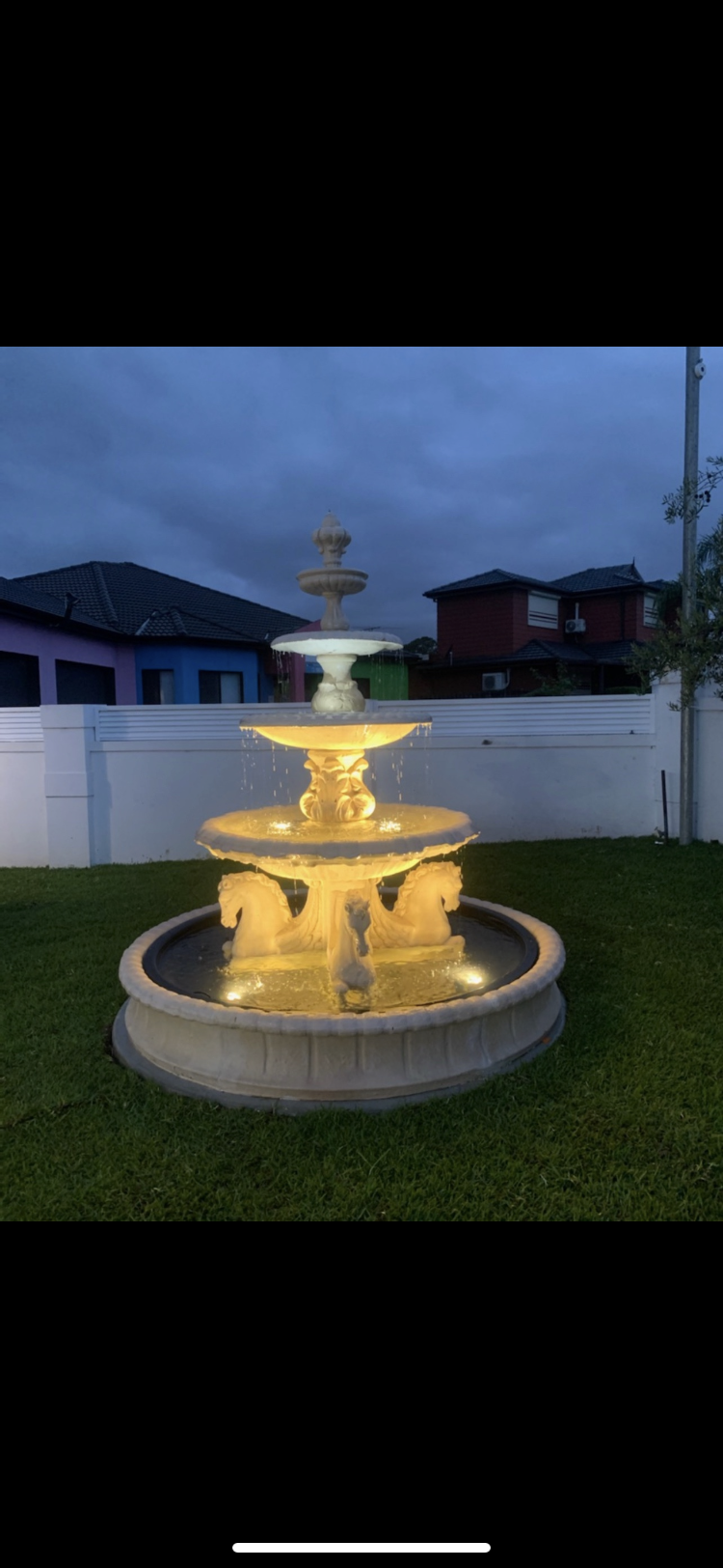 Quarter horse fountain with wave pond surround